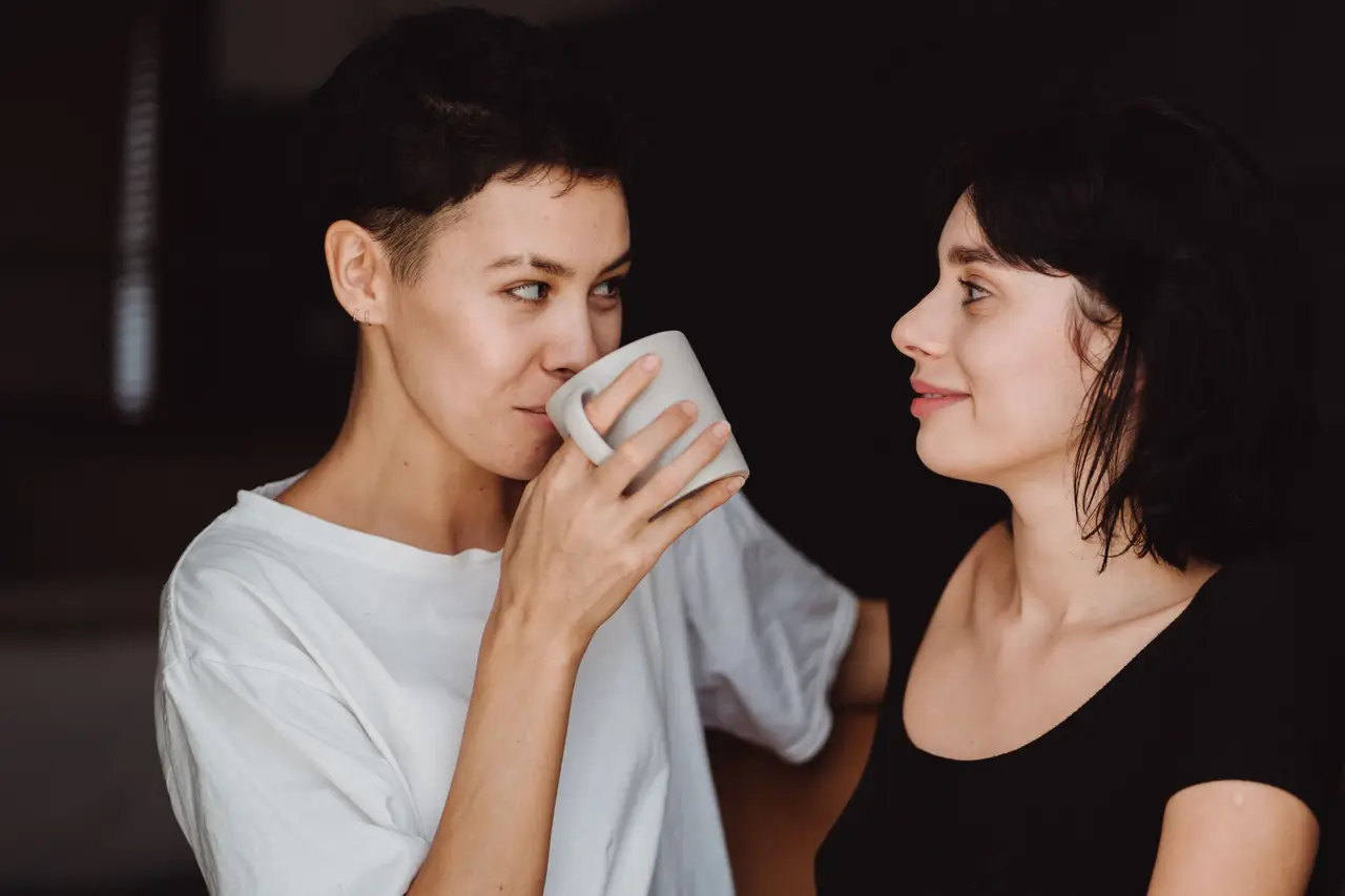 Two women catching up over coffee.
